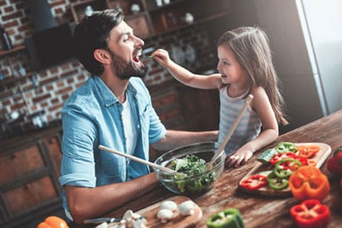 Father and Daughter cooking